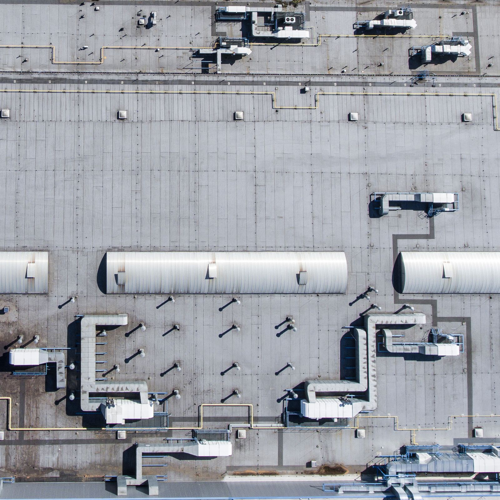 Aerial view of a flat roof with rooftop ductwork
