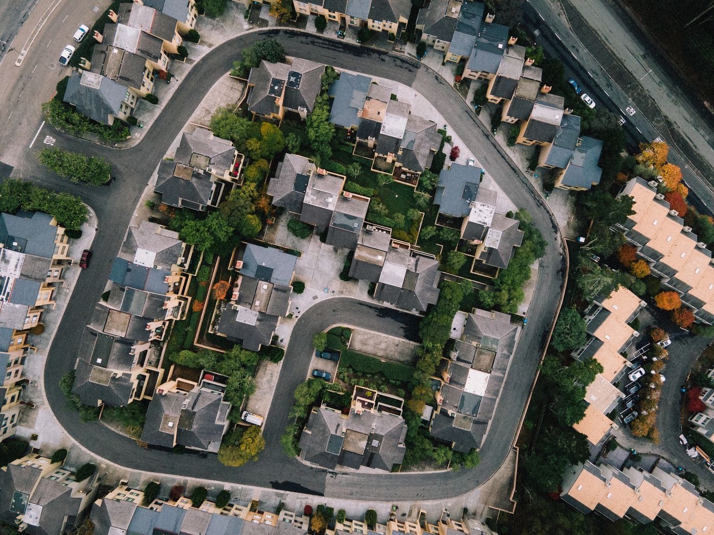 Aerial view of homes along a looping street