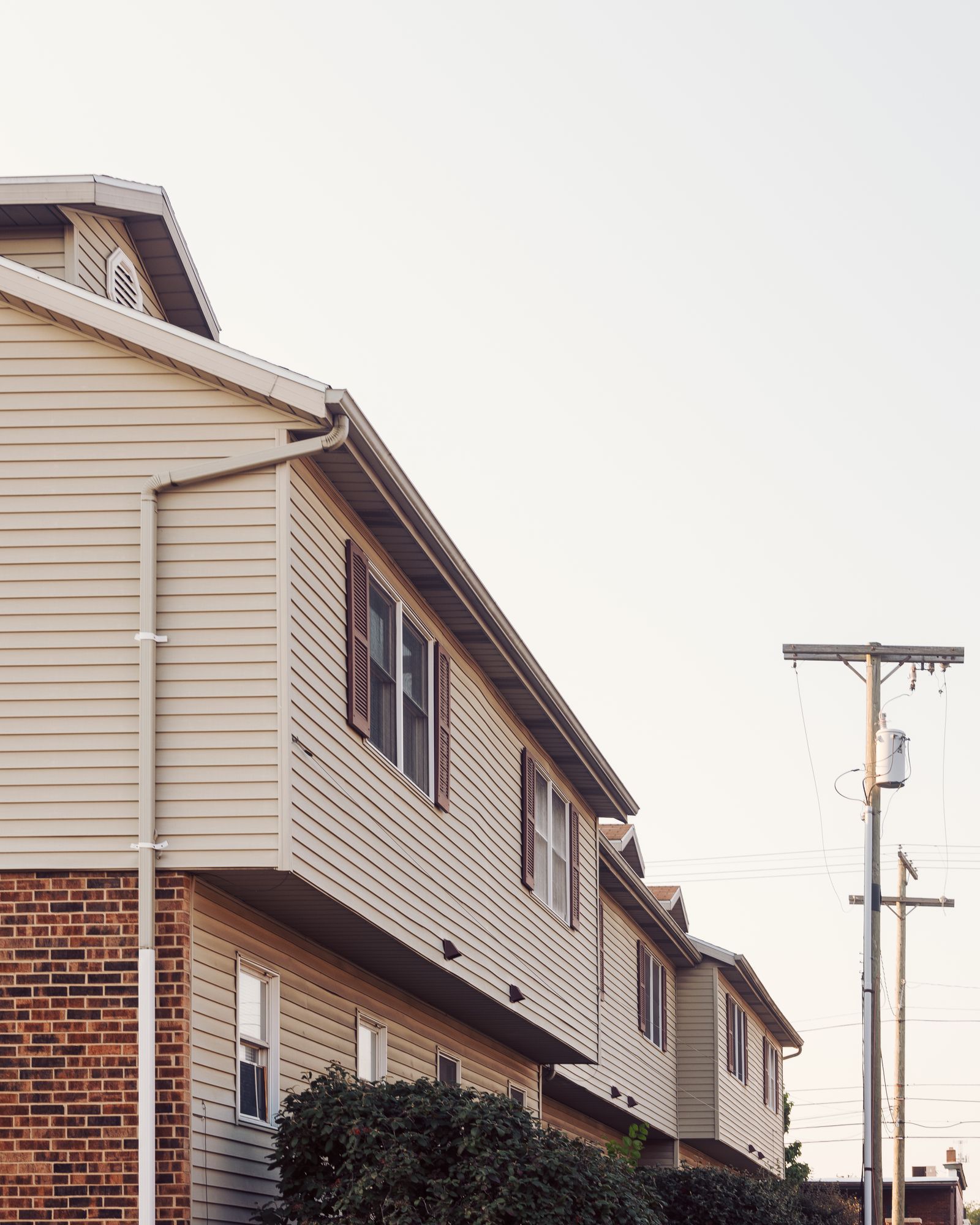 Building with light vinyl siding