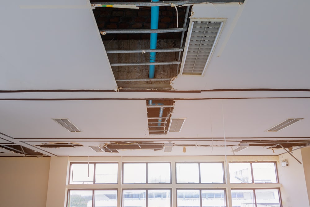 Office ceiling opened up to trace a leak