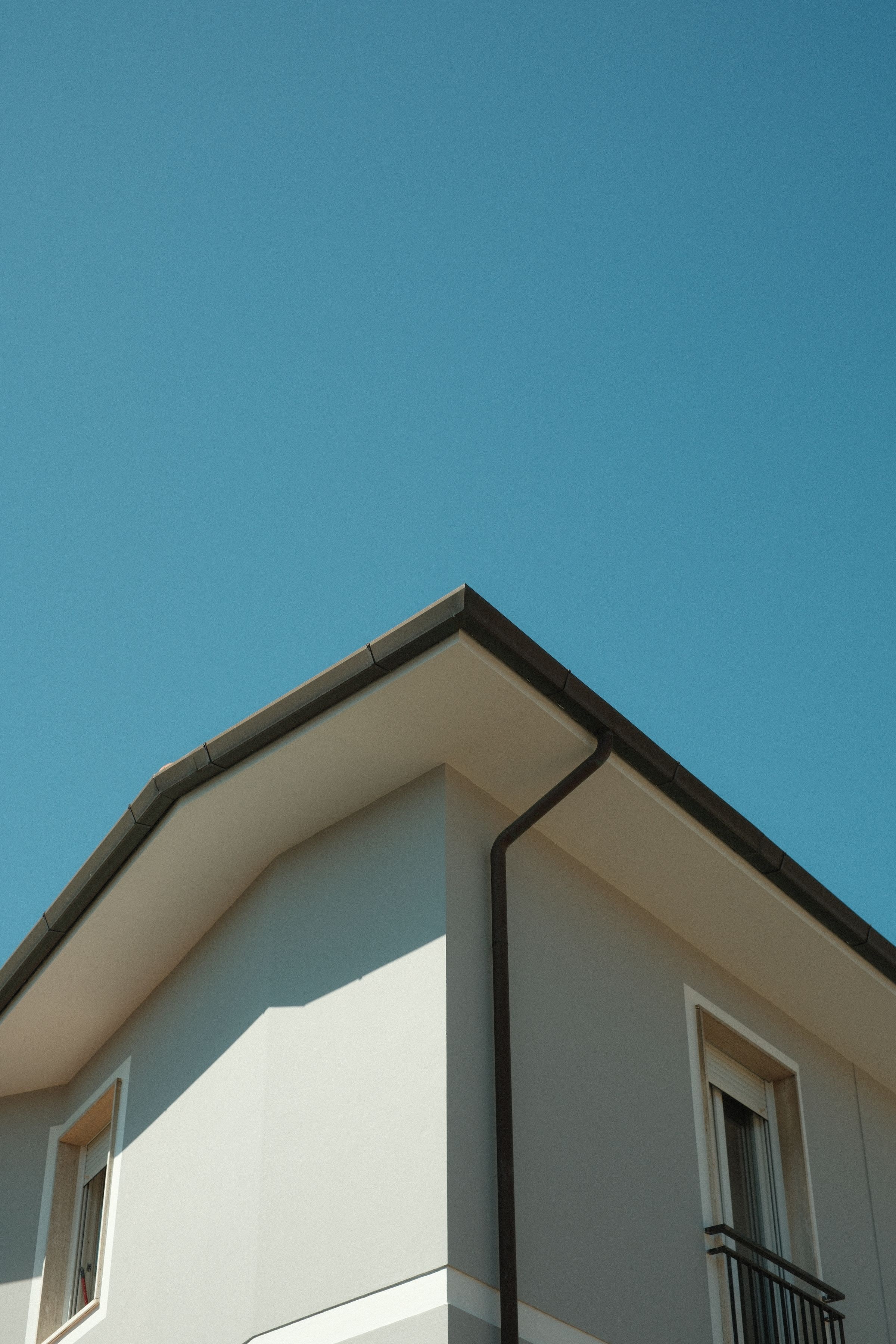 Fascia board and gutter along the edge of a roof overhang