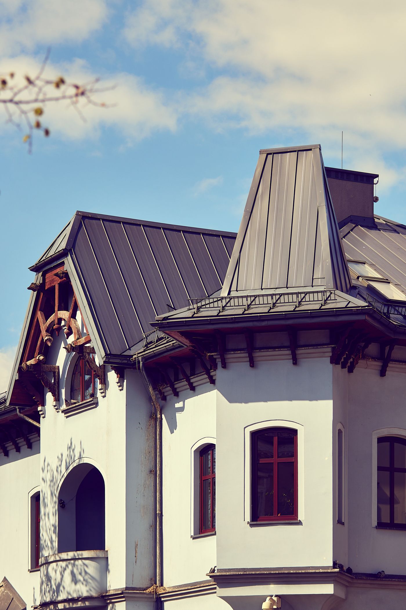Historic house with a dark metal roof