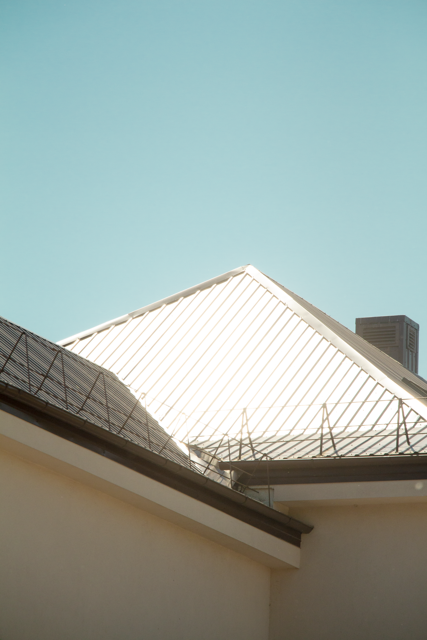 Light metal roof shining in the sun
