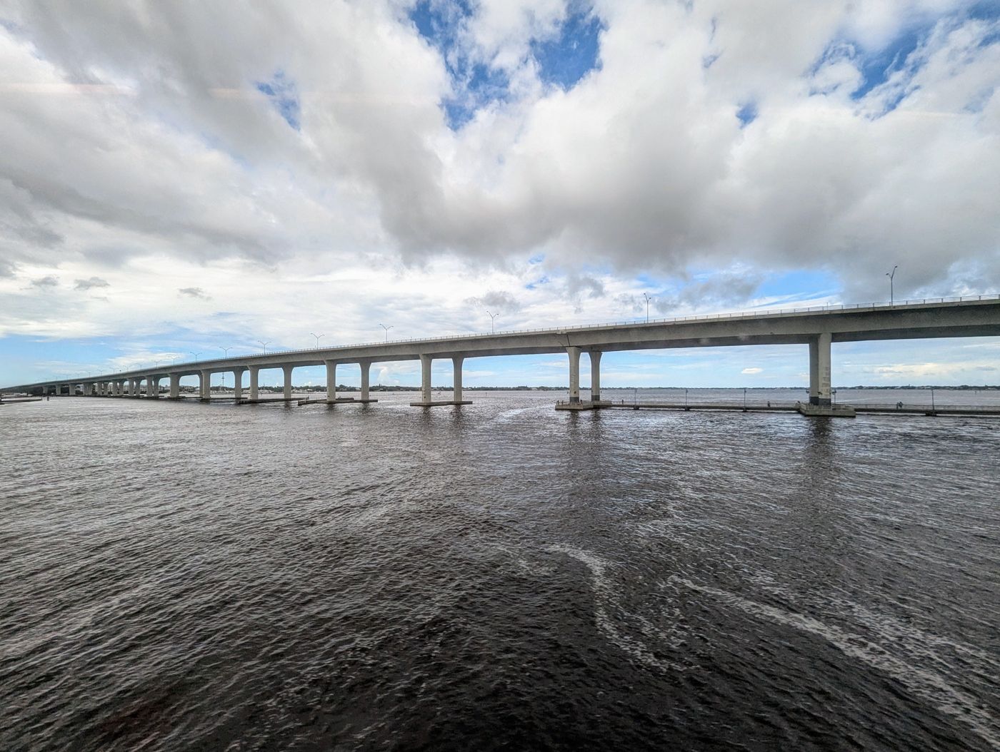 Long low bridge over open water