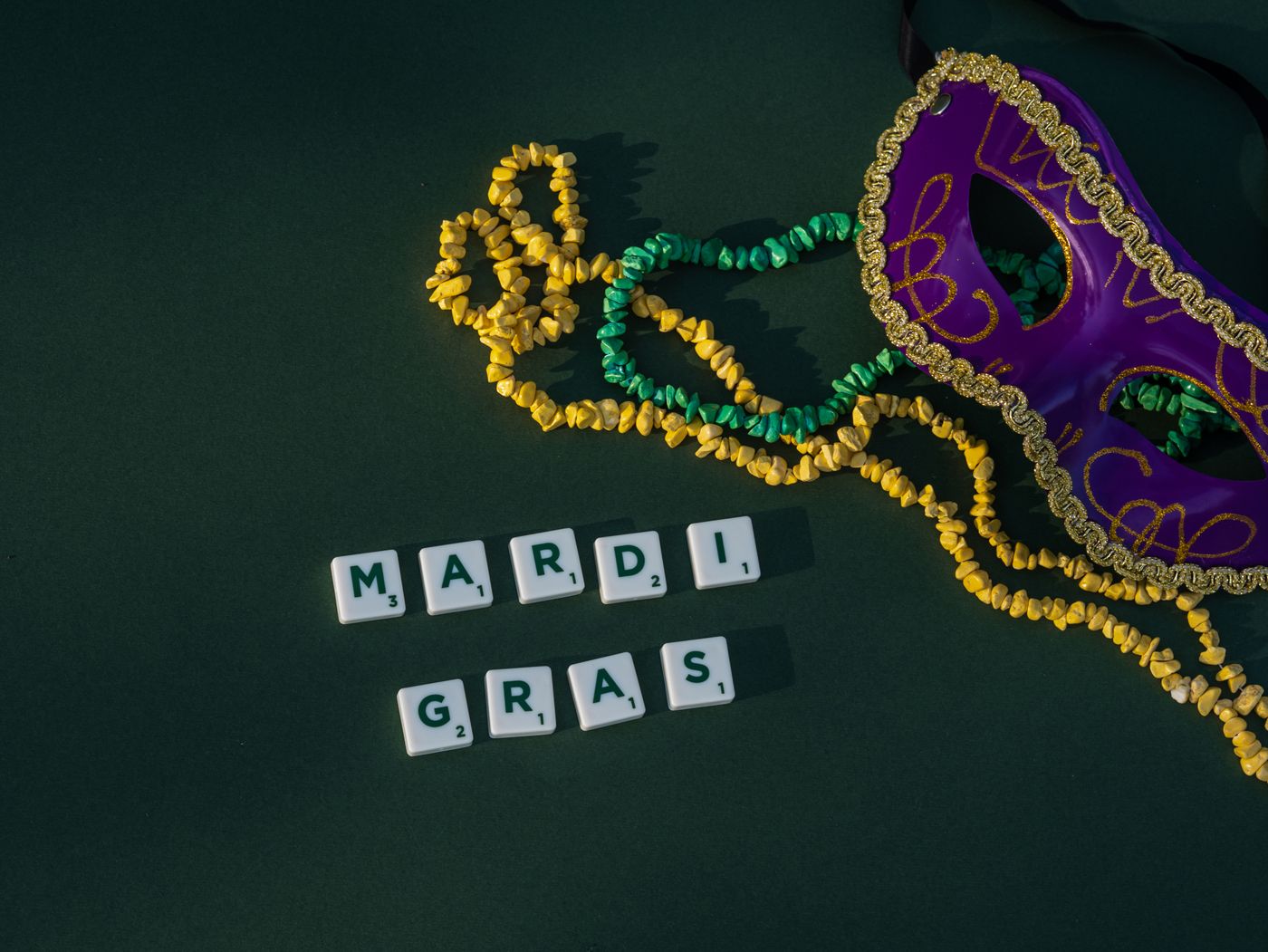 Mardi Gras mask and beads