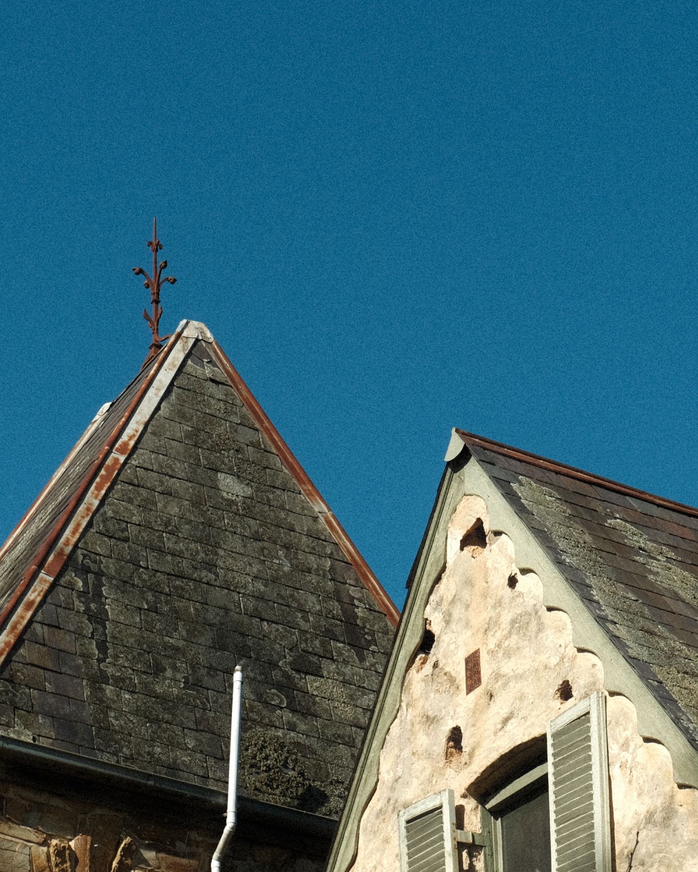 Old slate roof on two steep gables