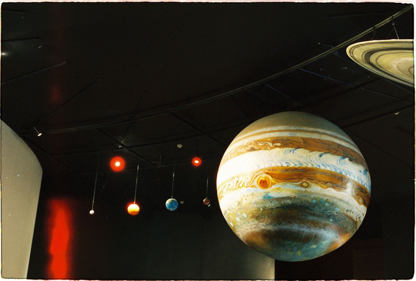 Planet models hanging in a science exhibit