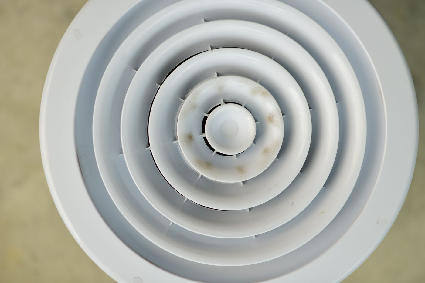 Round air vent in a ceiling