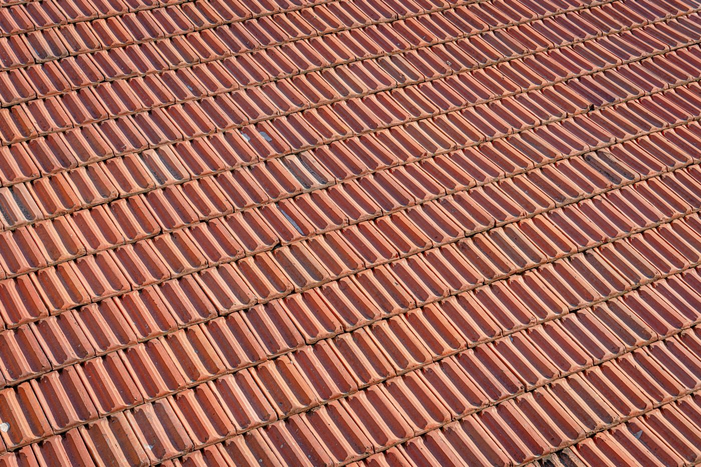Rows of red clay roof tiles