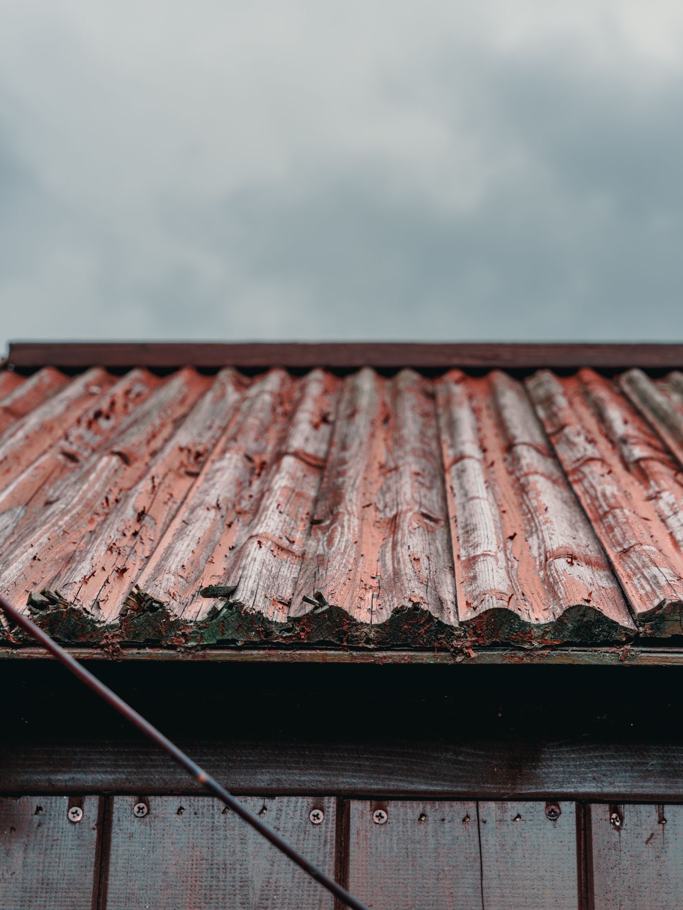 Rusted, worn metal roof panels