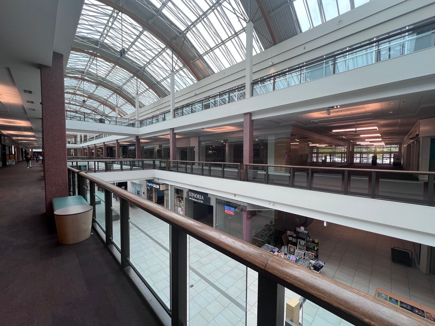 Shopping mall interior under a glass skylight