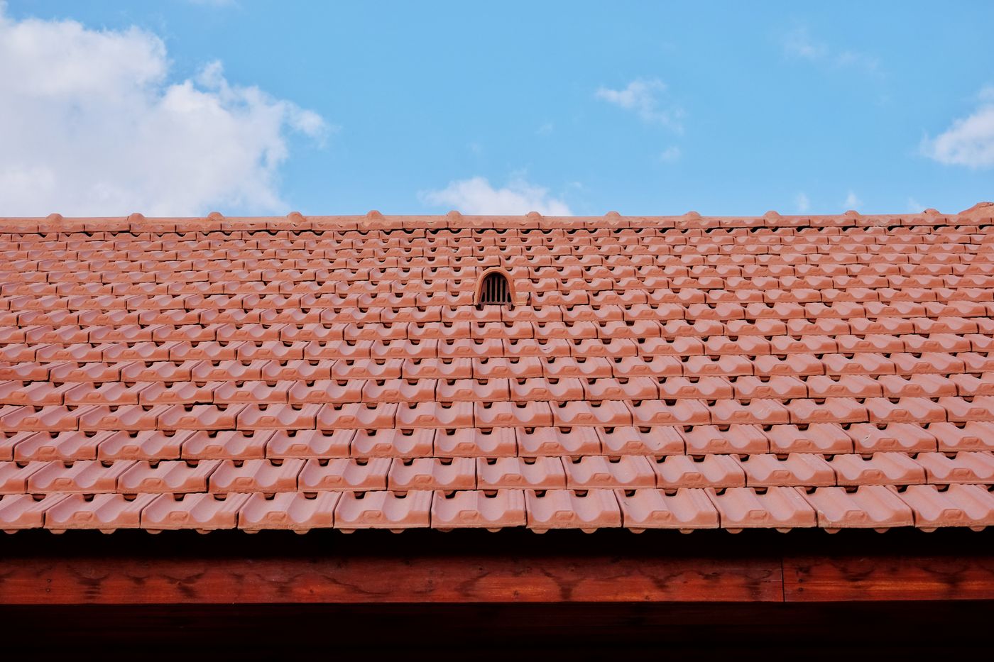 Tile roof with a small roof vent