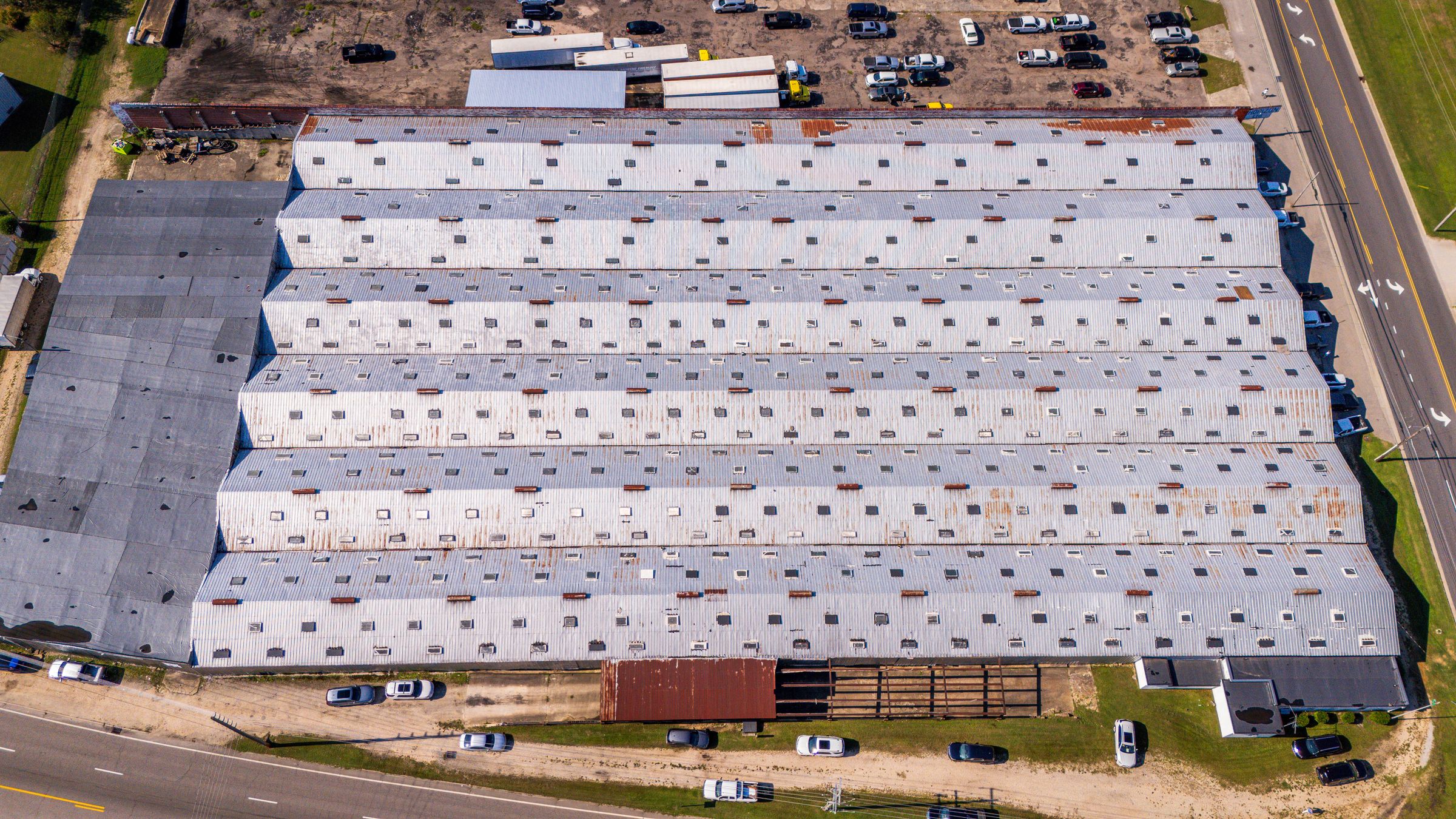 Aerial view of a large warehouse roof