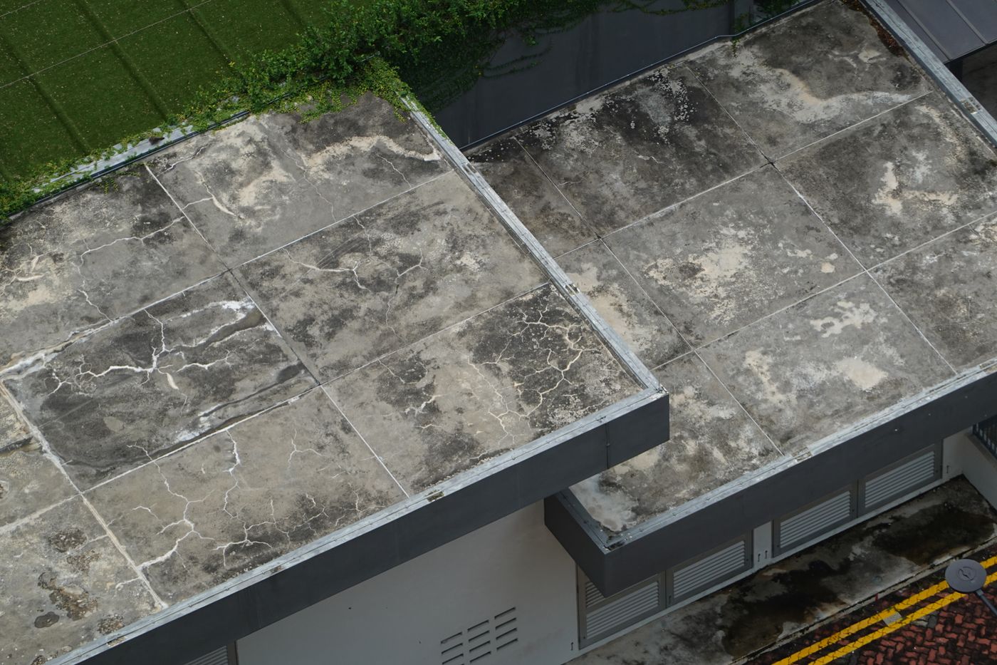Weathered concrete flat roof on a building